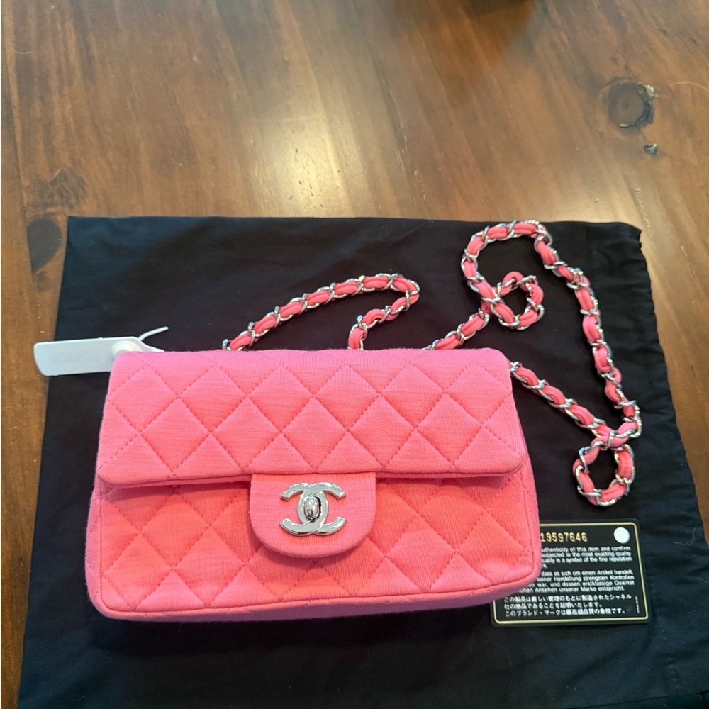 SOLD-Pink Quilted Clutch with Silver Logo